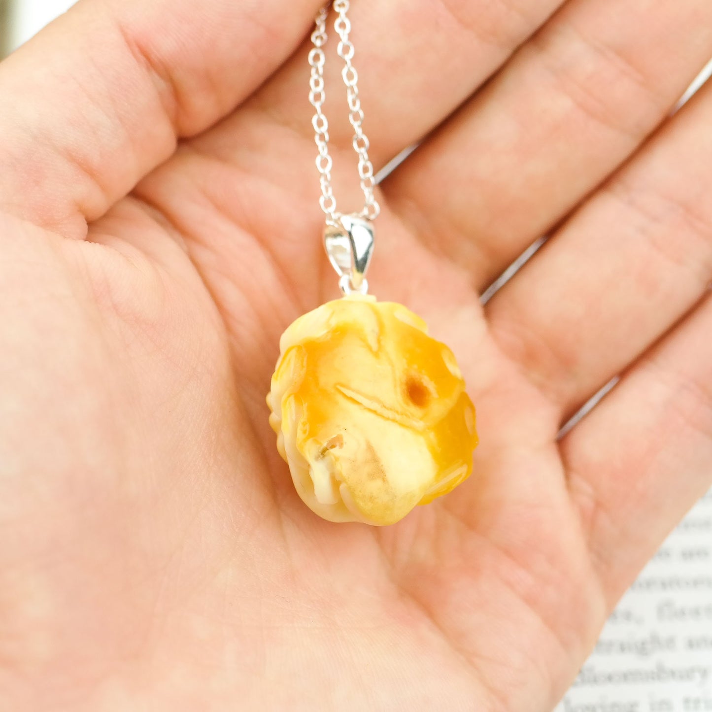 Natural amber hand carved pendants