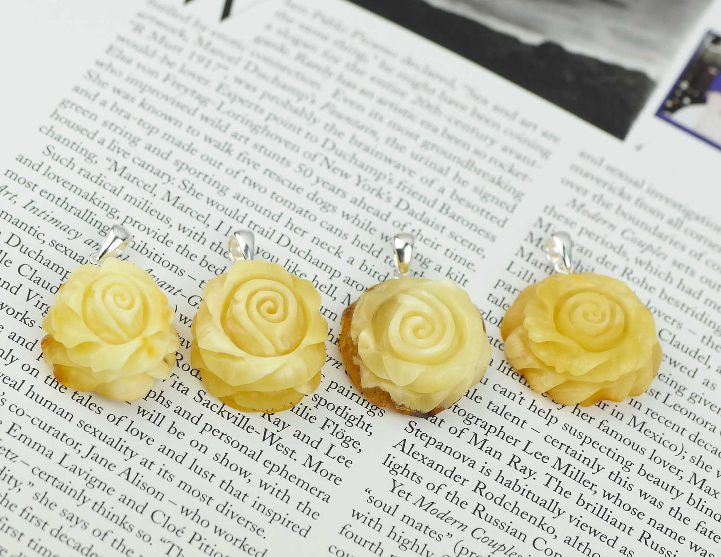 Natural amber hand carved pendants