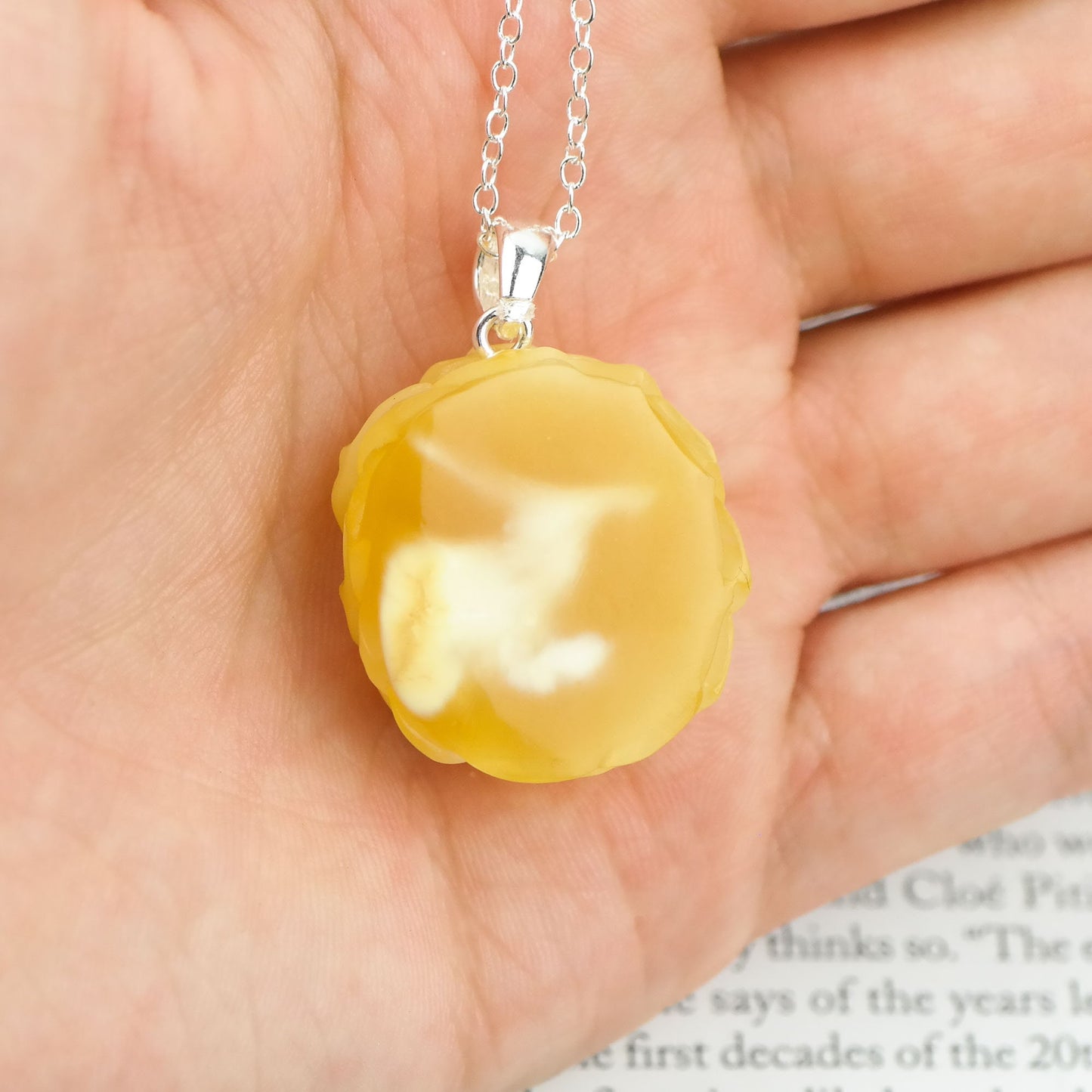 Natural amber hand carved pendants