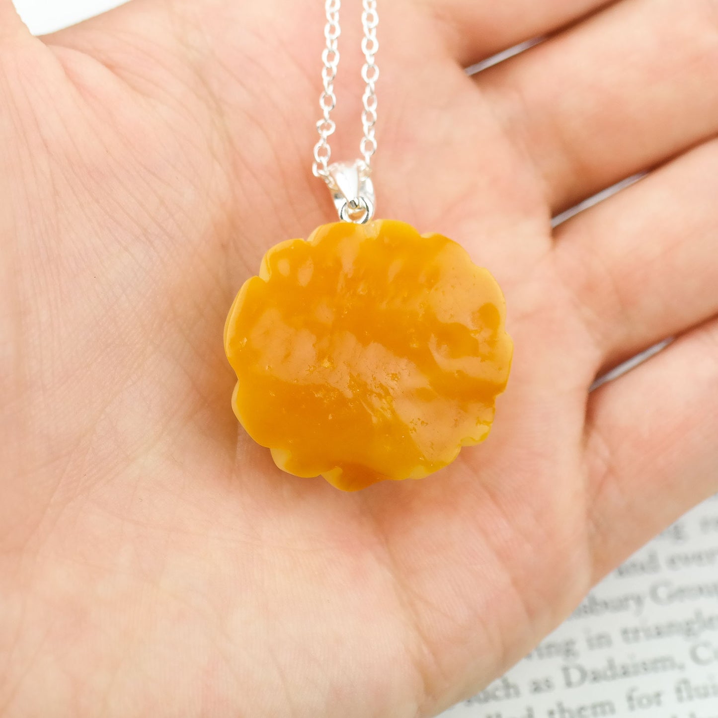 Natural amber hand carved pendants