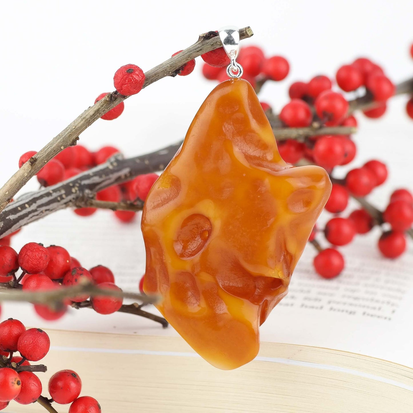 Hand carved amber lion head