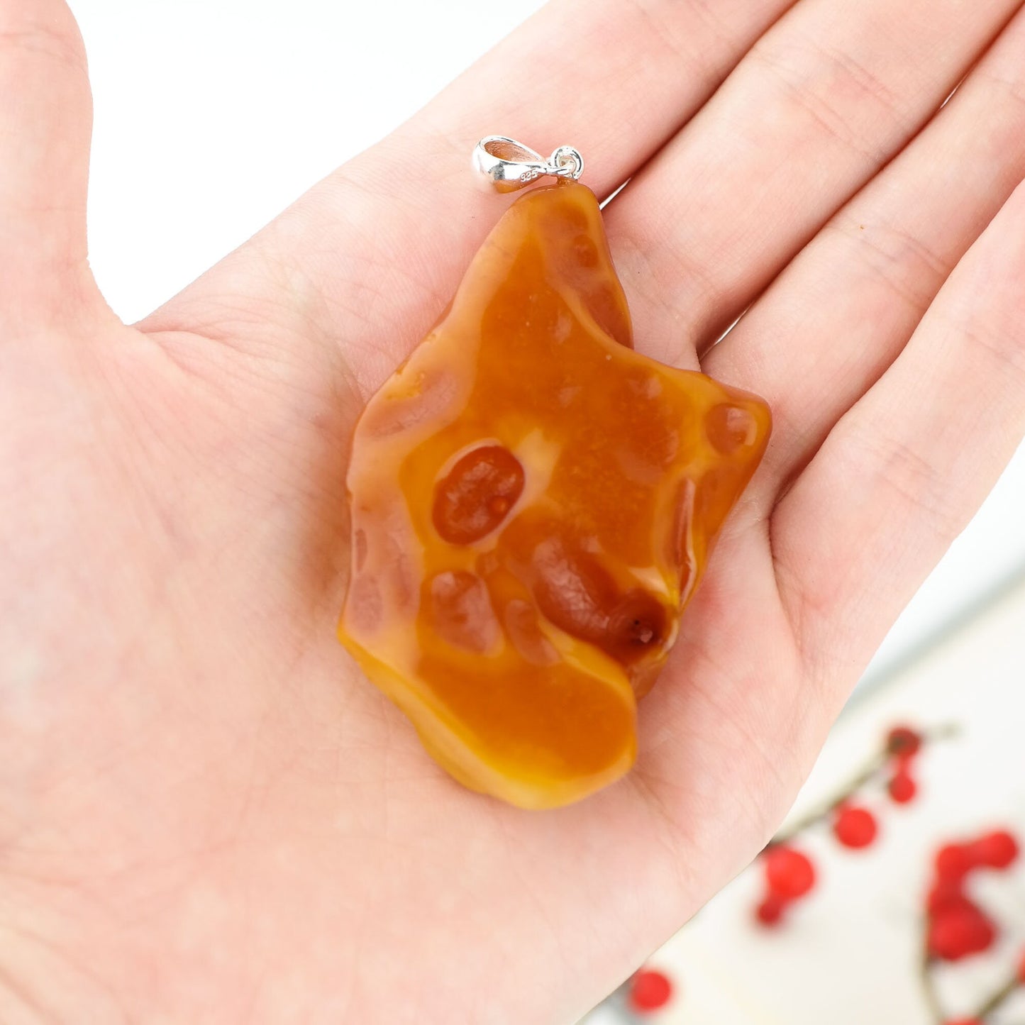 Hand carved amber lion head
