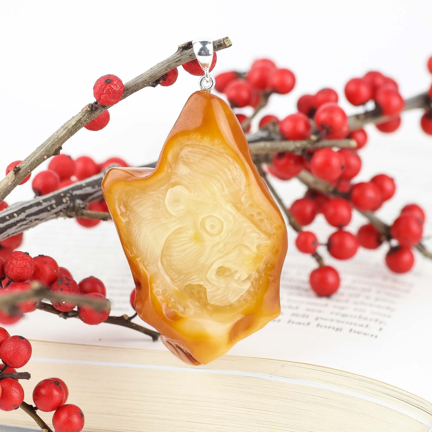 Hand carved amber lion head