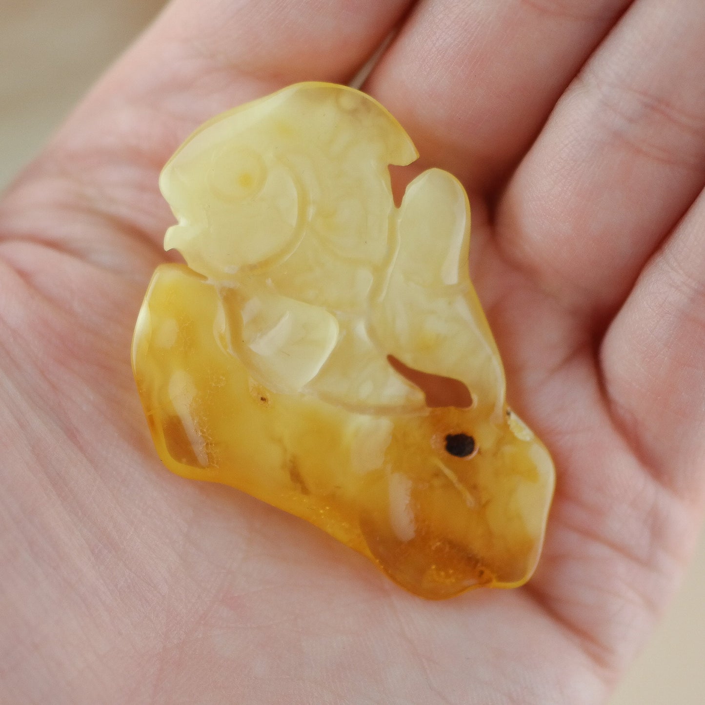 Hand carved amber fish figurine