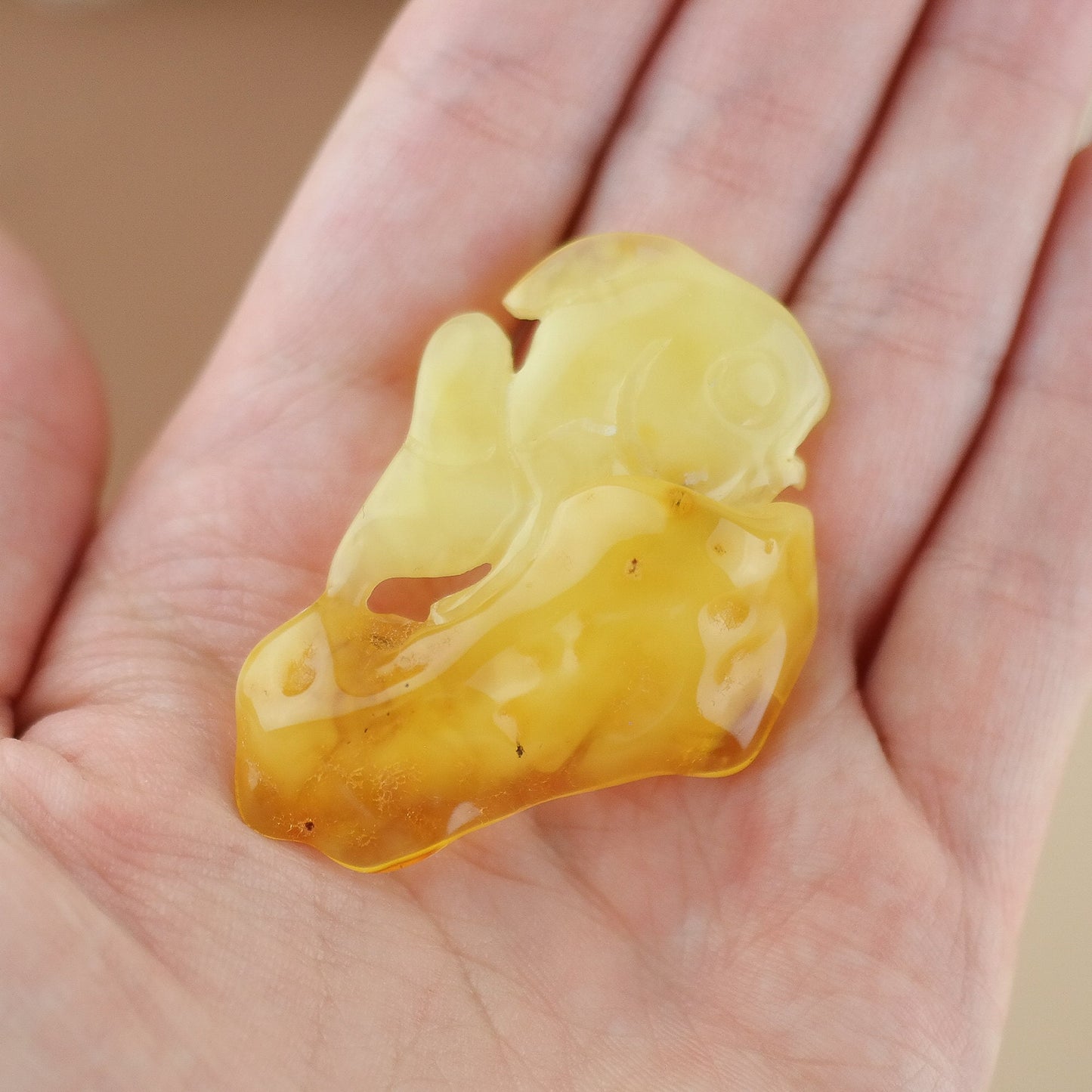 Hand carved amber fish figurine