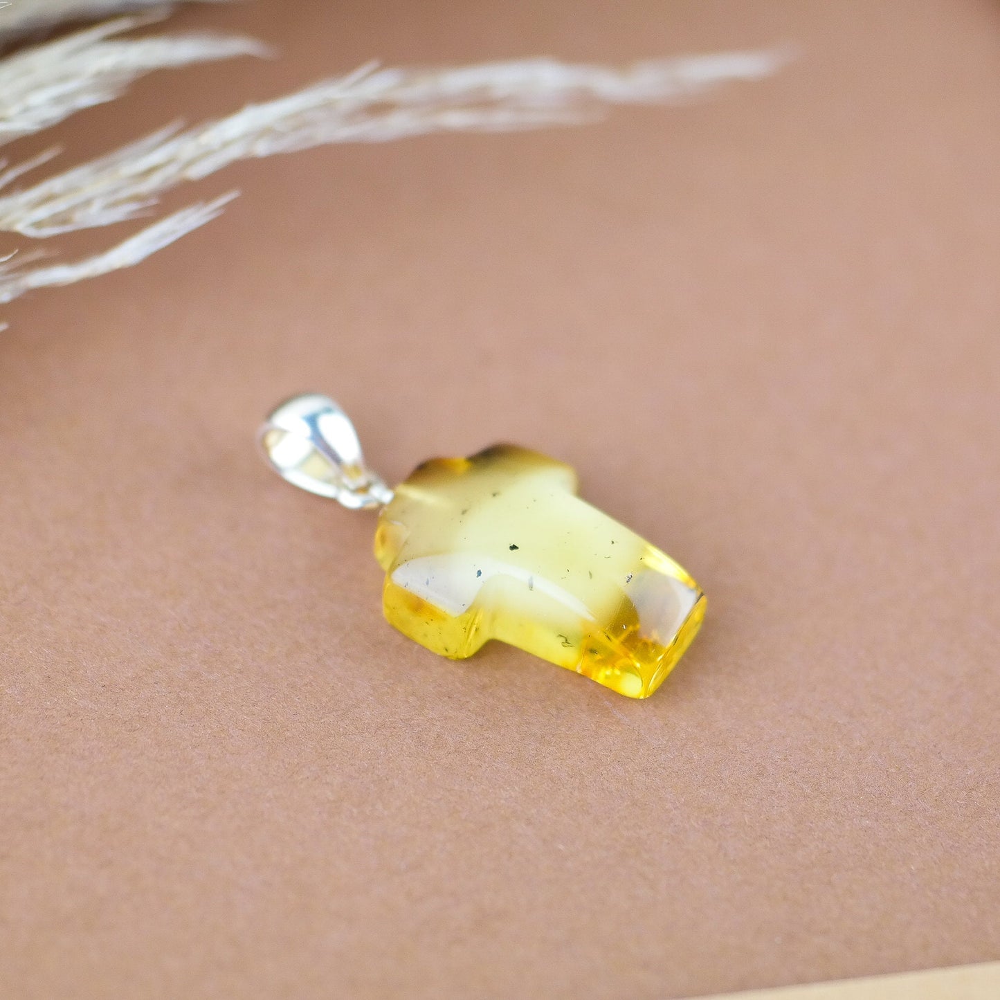 Amber cross pendant