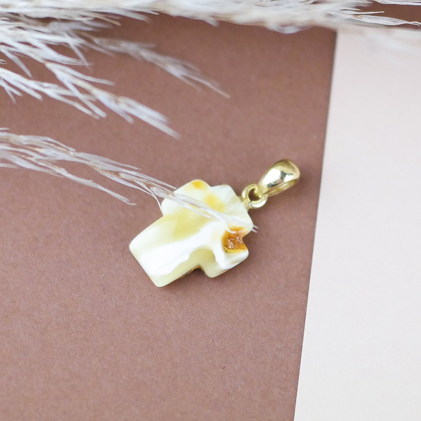 Unique amber cross pendant