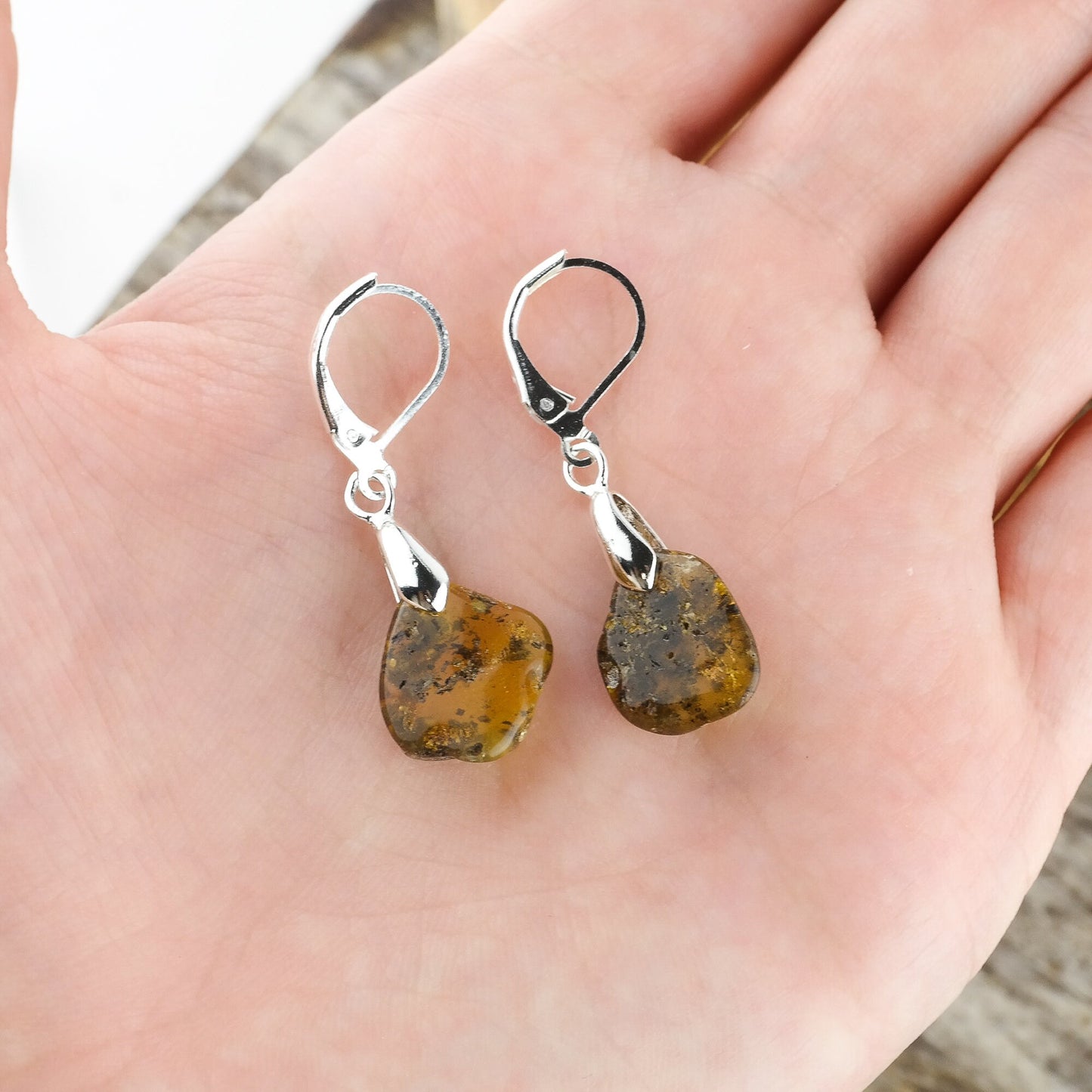 Earrings with natural amber beads