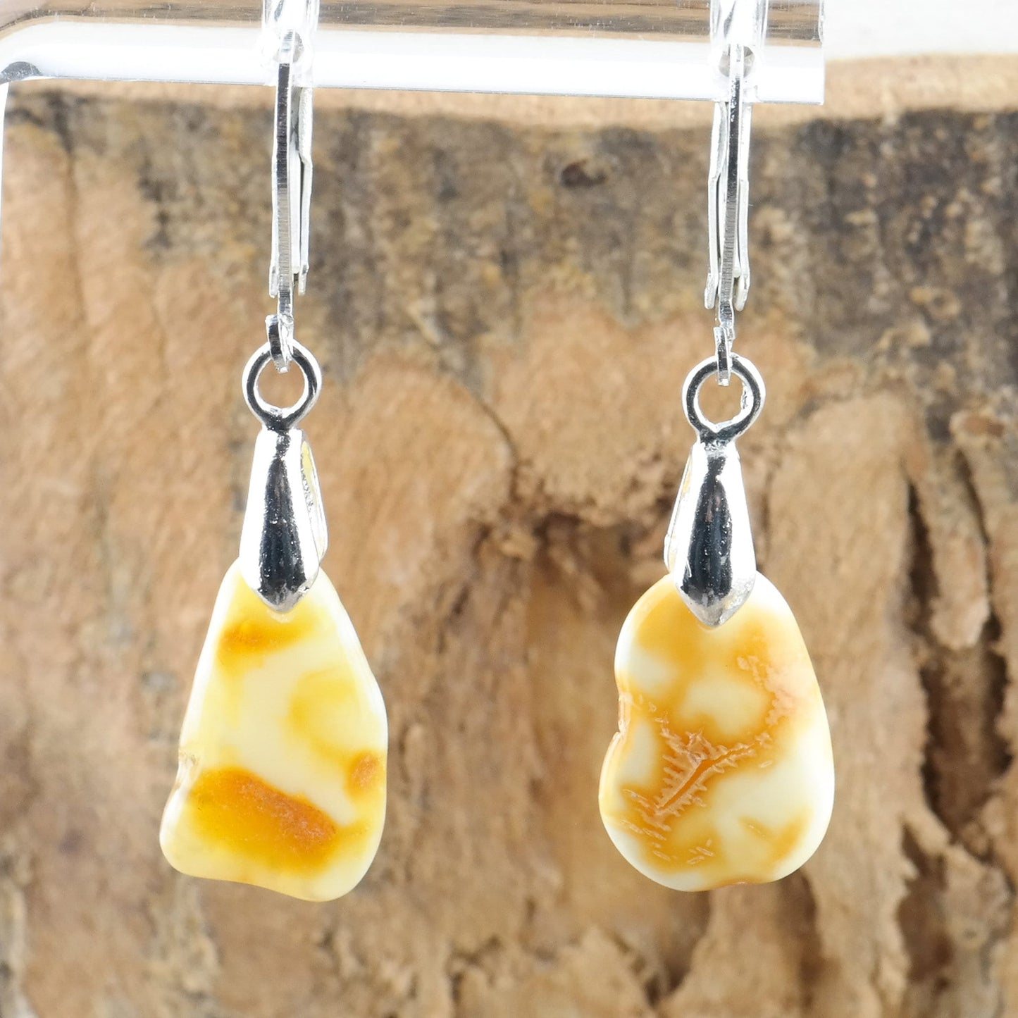 Earrings with natural amber beads