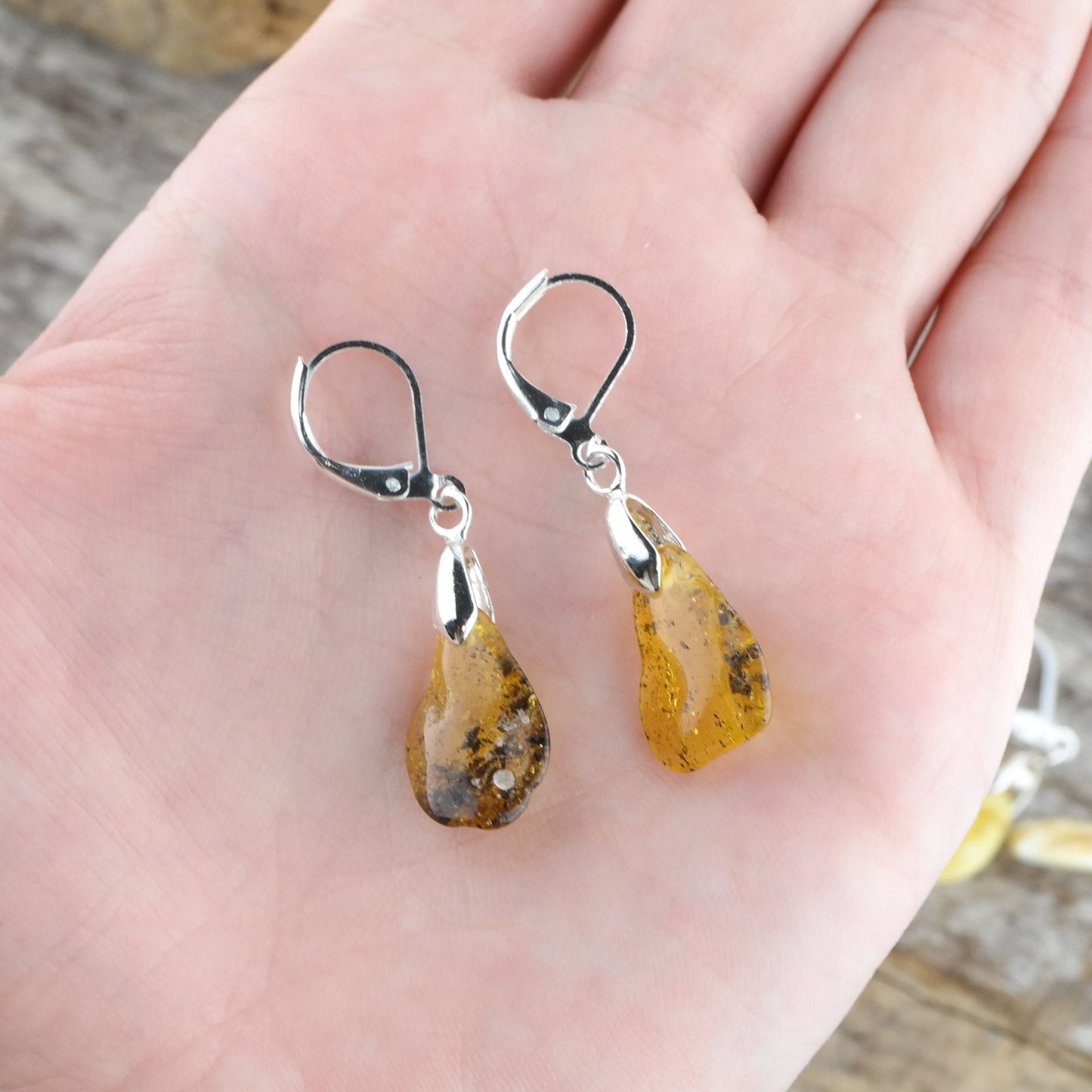Earrings with natural amber beads