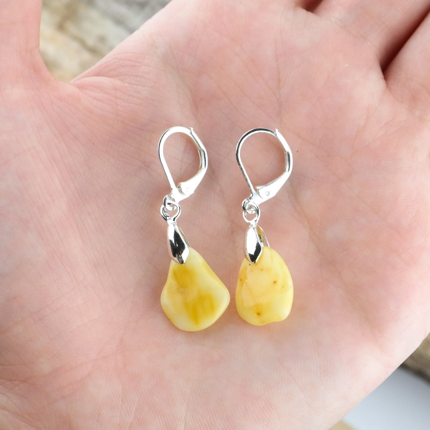 Earrings with natural amber beads