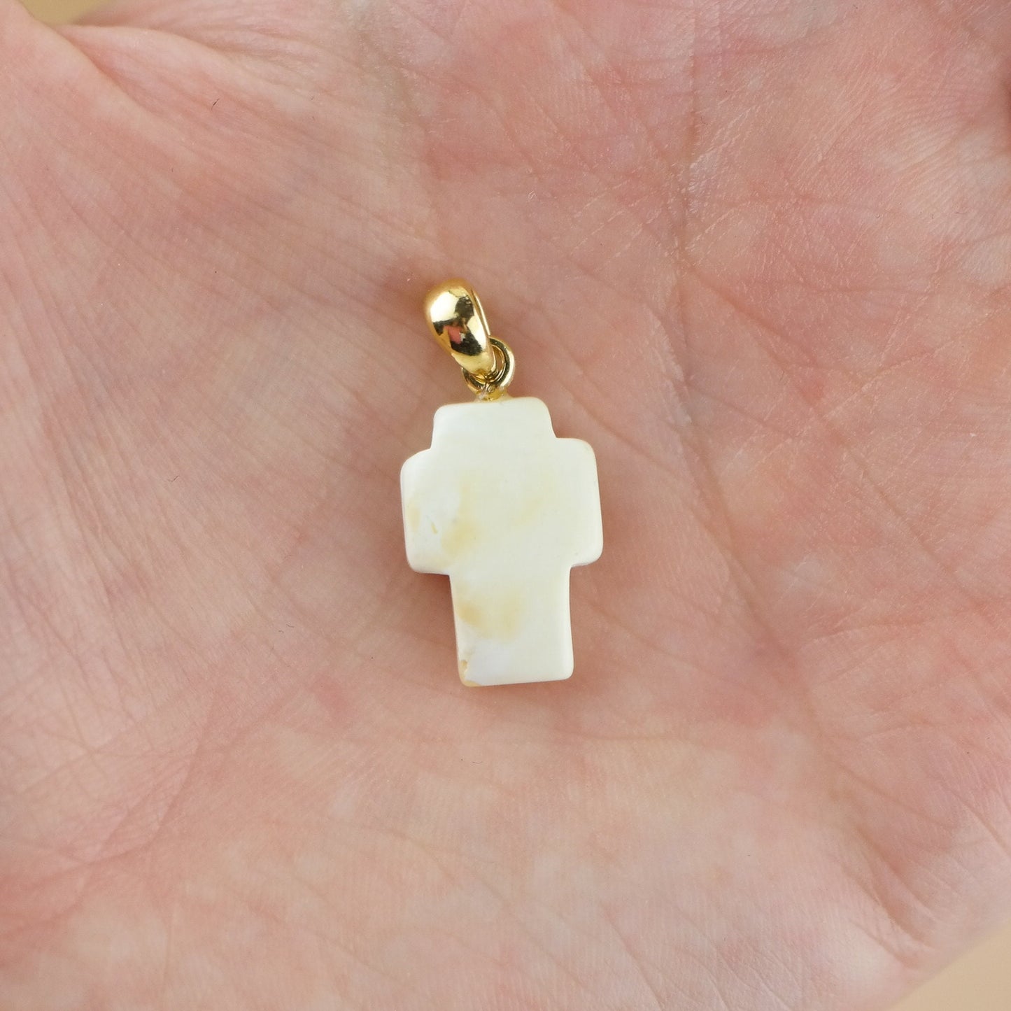 White amber cross pendant
