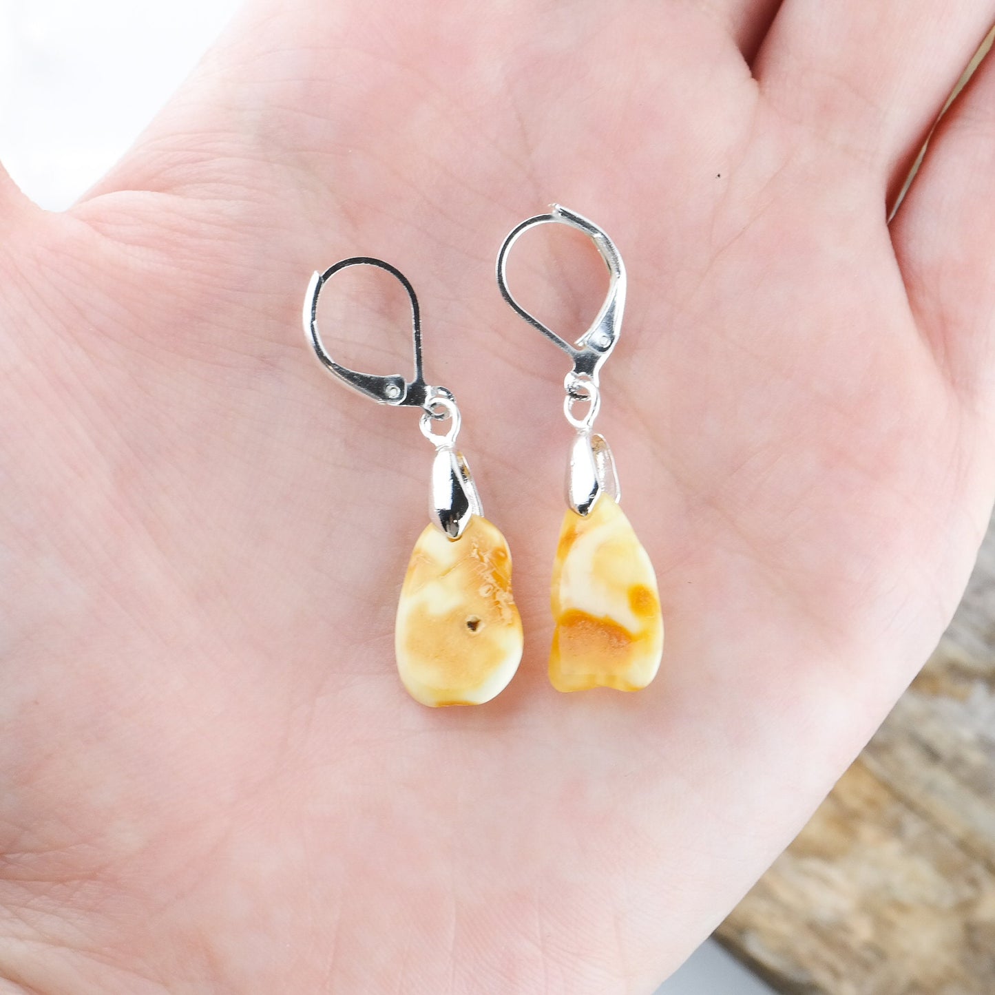 Earrings with natural amber beads