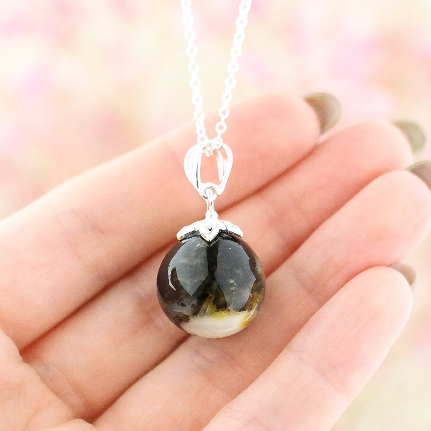 Silver round amber pendant