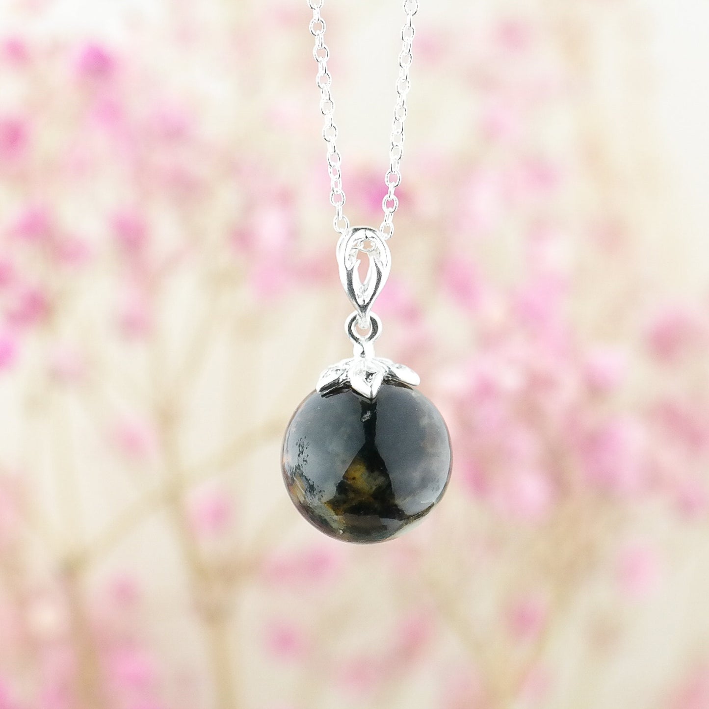 Silver round amber pendant