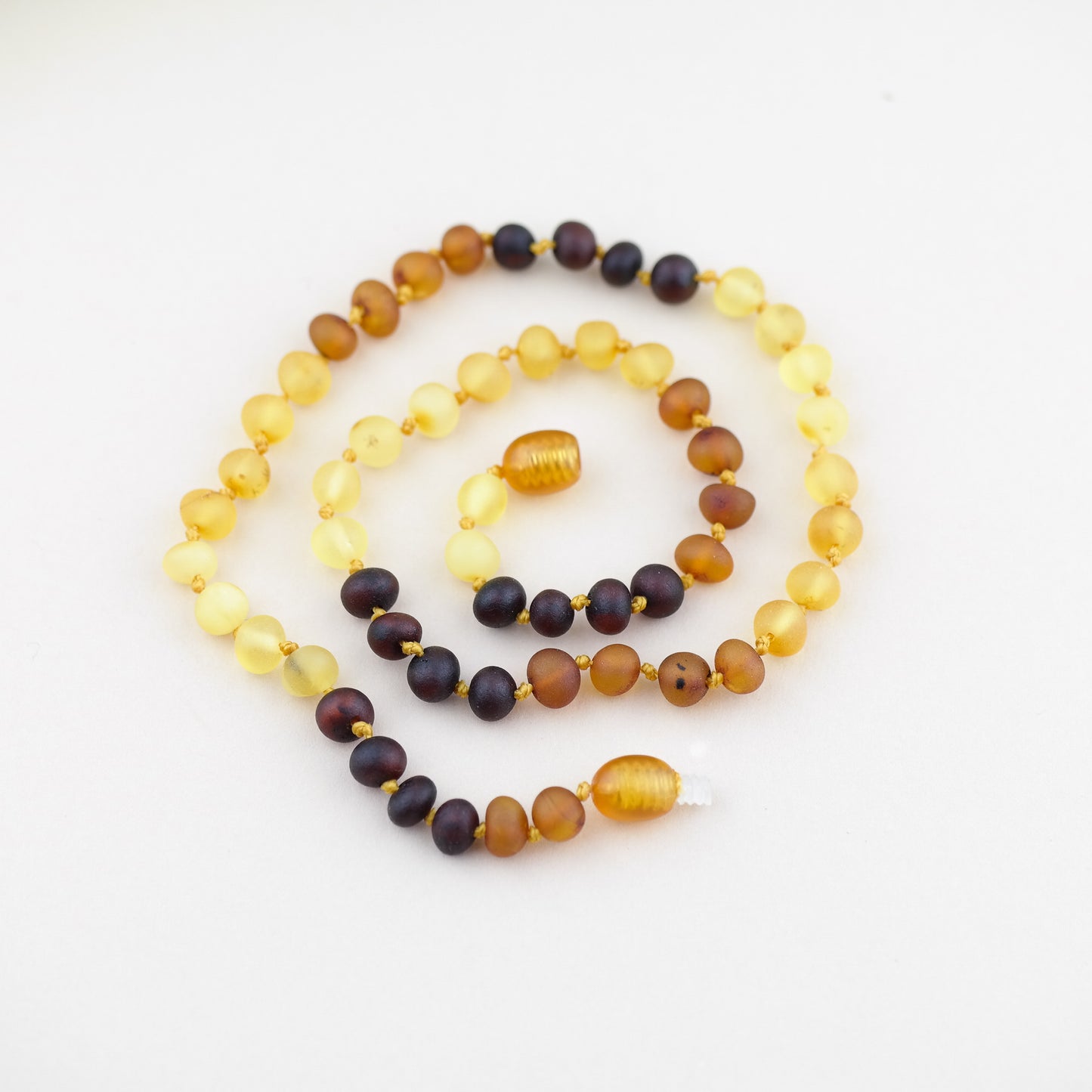 Raw amber rainbow necklaces