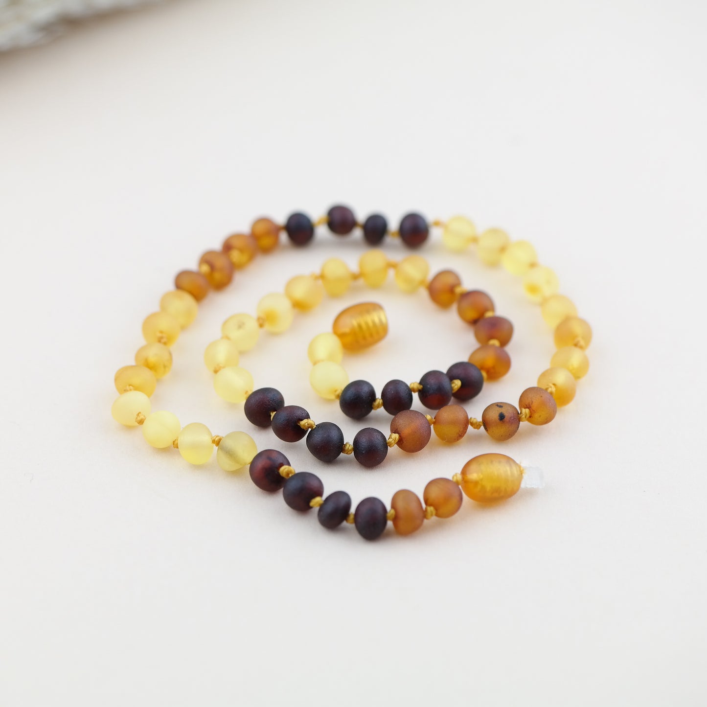 Raw amber rainbow necklaces