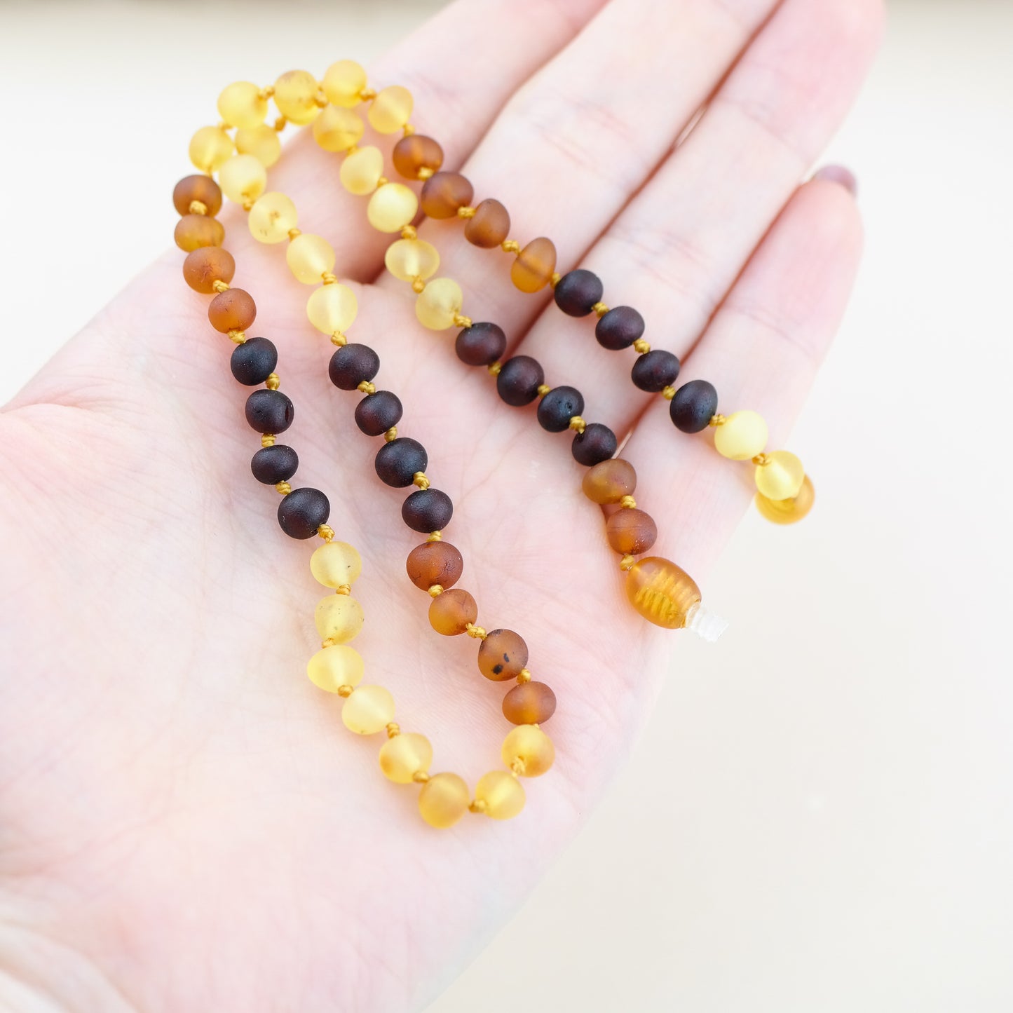 Raw amber rainbow necklaces