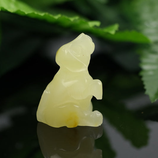 Handmade dog figurine from natural Baltic amber