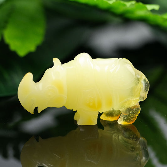 Natural Baltic amber hand carved Rhino figurine