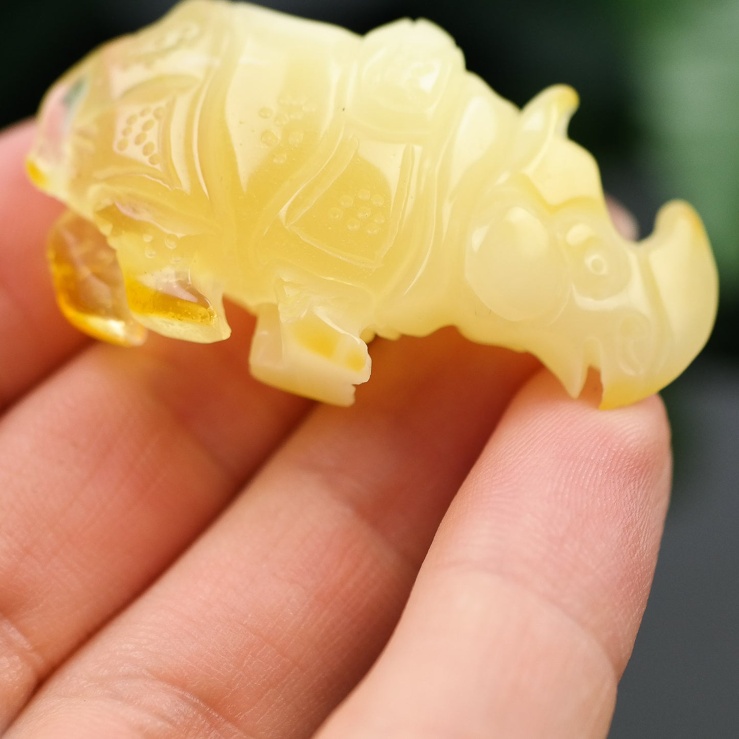 Natural Baltic amber hand carved Rhino figurine