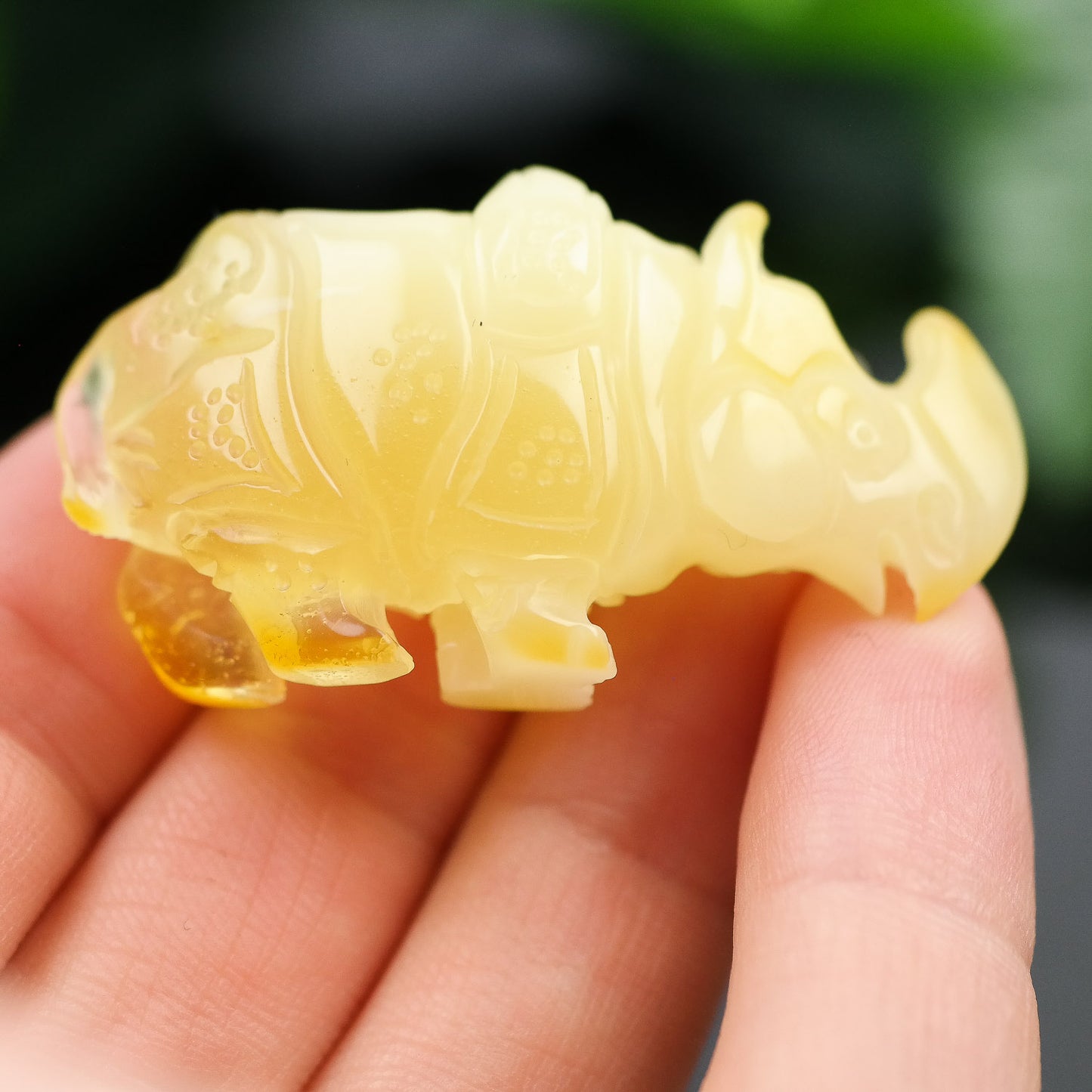 Natural Baltic amber hand carved Rhino figurine