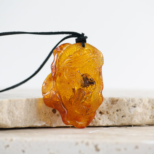 Baltic amber dragon pendant