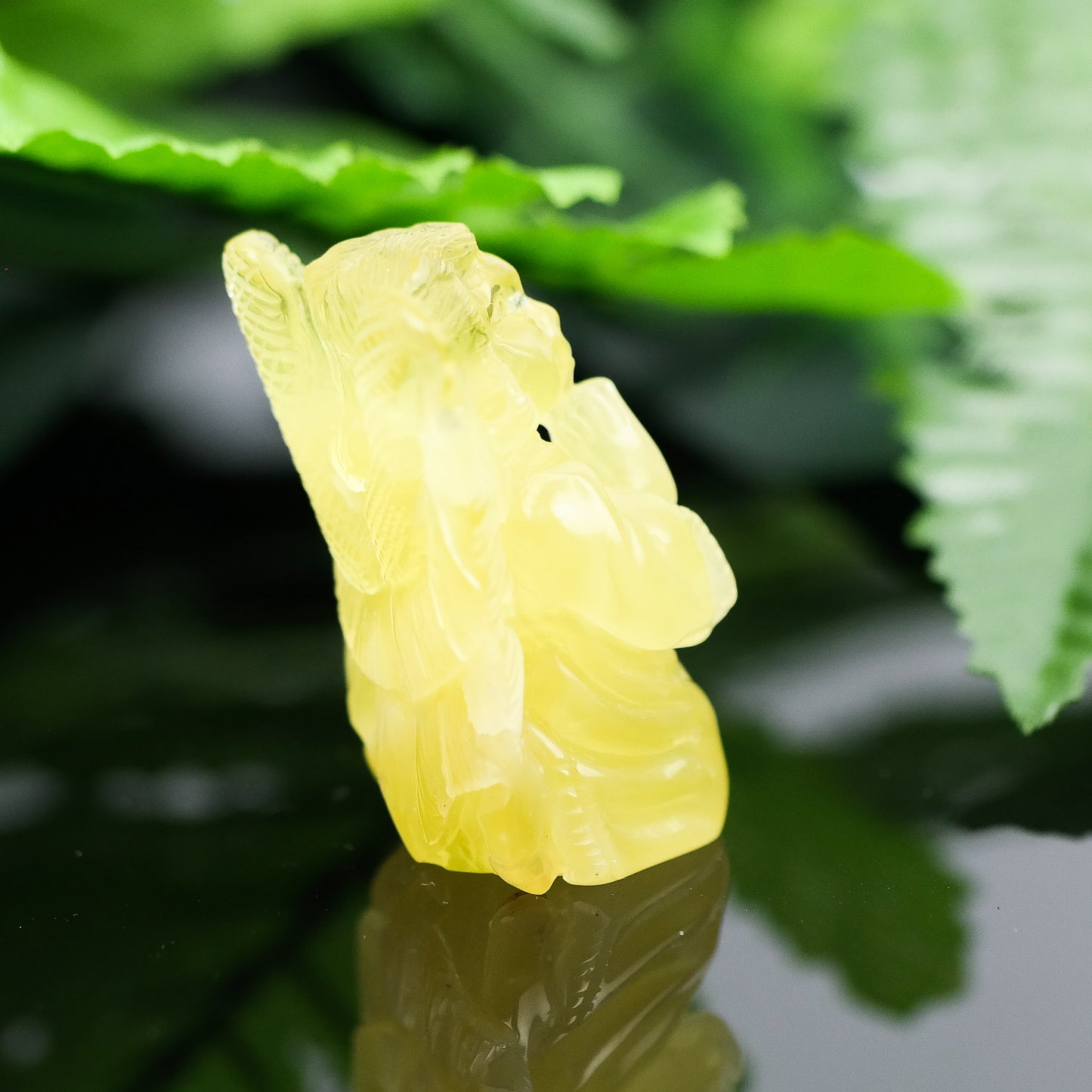 Hand carved angel figurine from natural Baltic amber