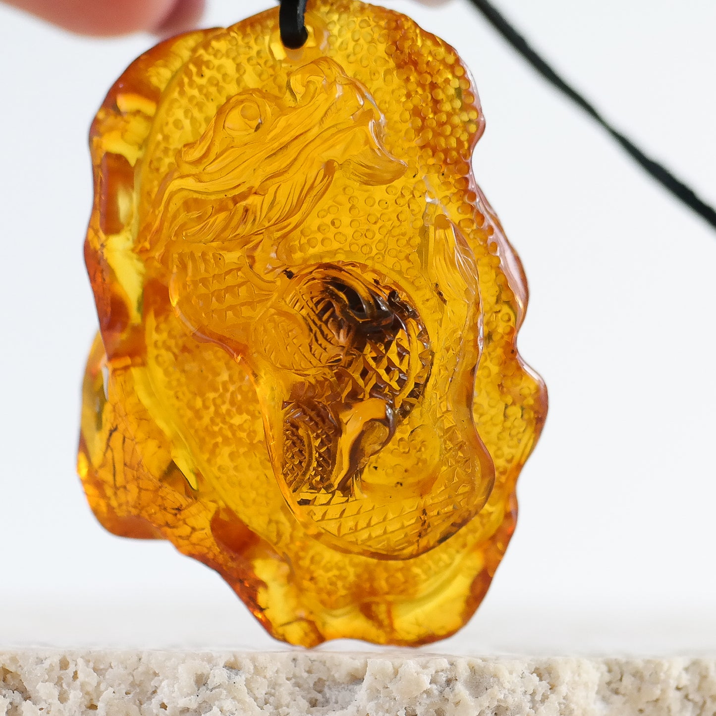 Baltic amber dragon pendant