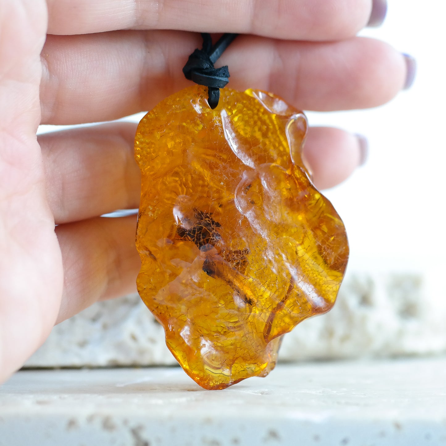 Baltic amber dragon pendant