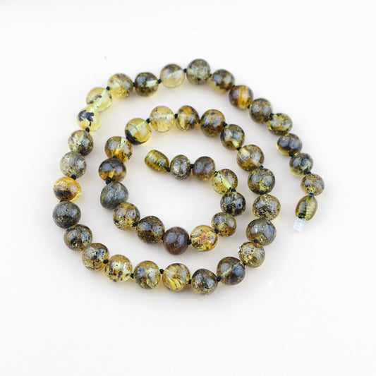 Green amber necklace from large baroque beads