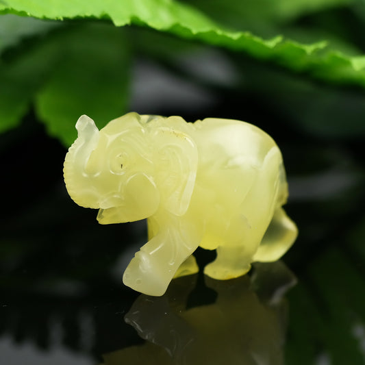 Hand carved elephant figurine from natural Baltic amber