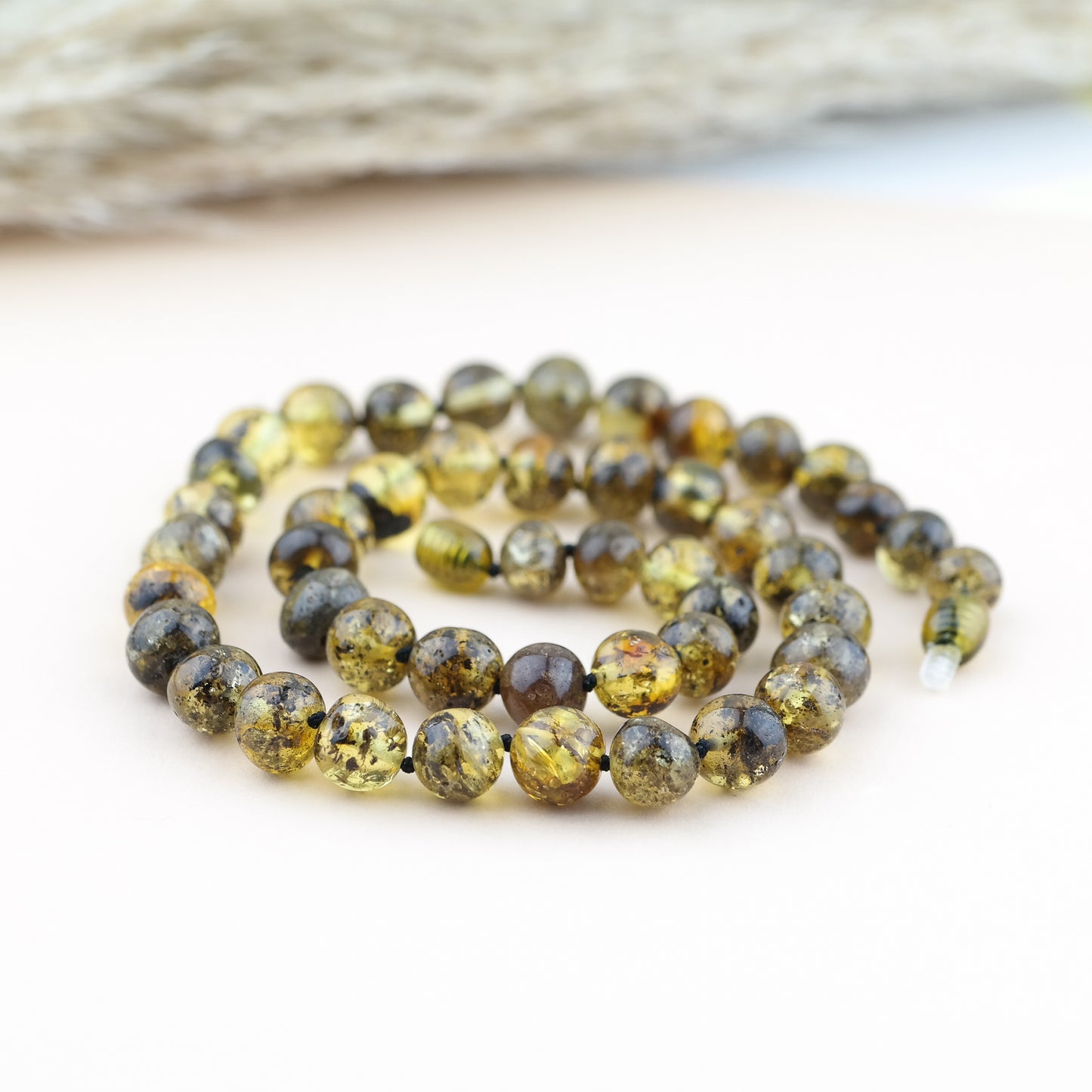 Green amber necklace from large baroque beads