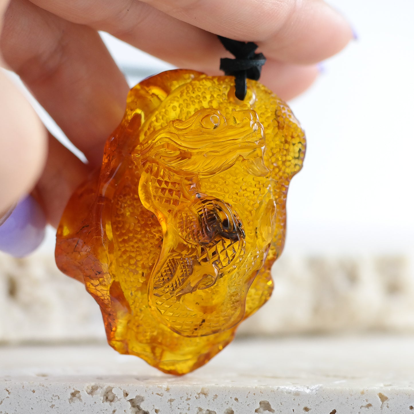 Baltic amber dragon pendant