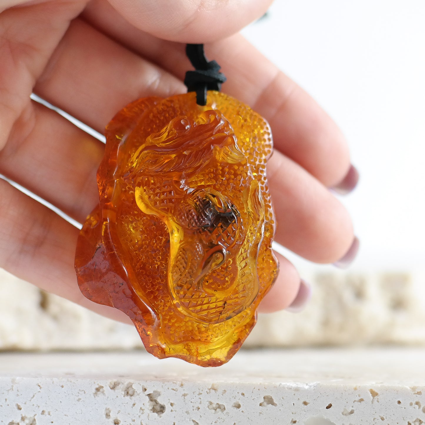 Baltic amber dragon pendant