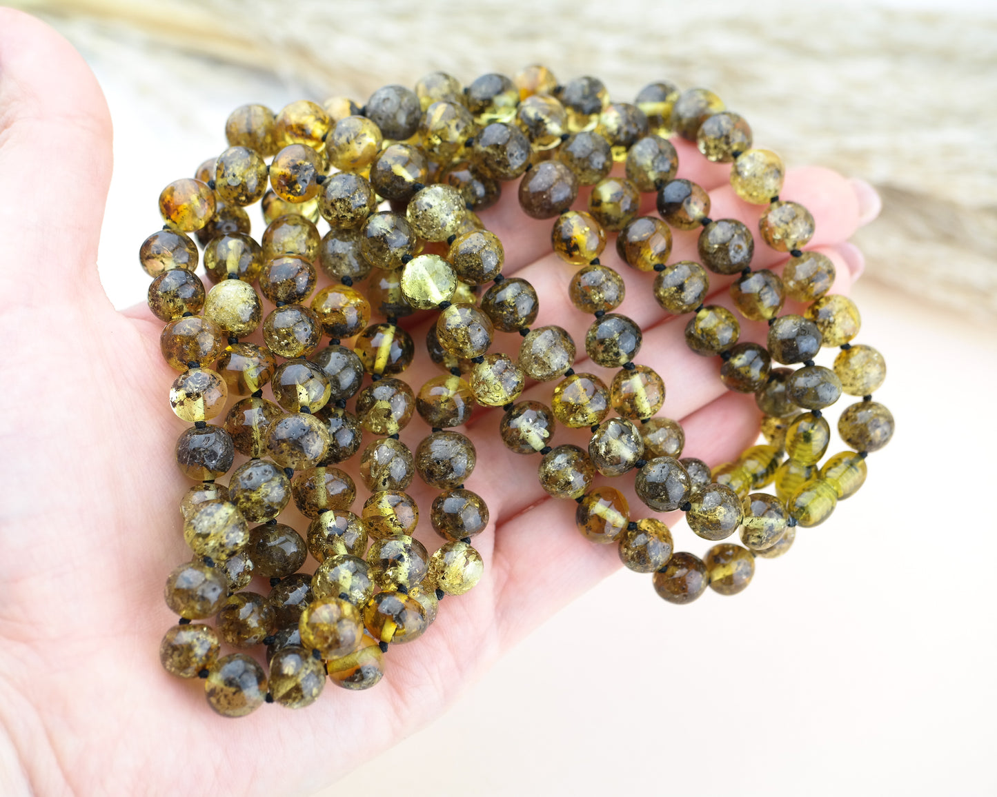 Green amber necklace from large baroque beads