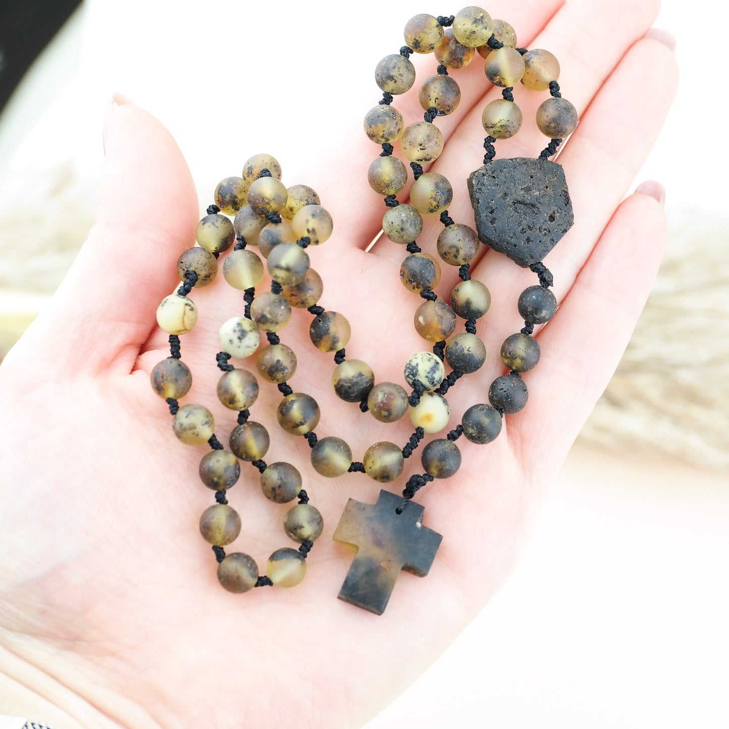 Baltic amber rosary made of green, baroque shaped amber beads