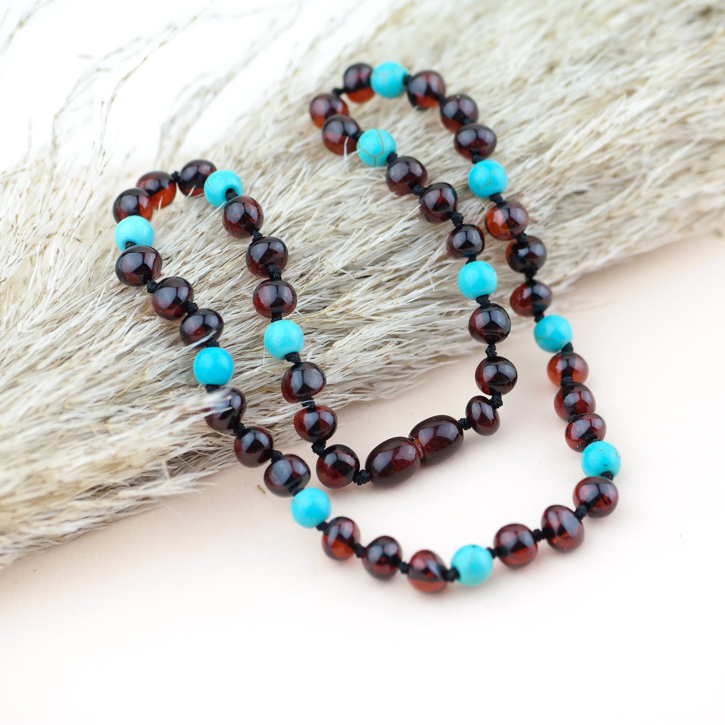 Handmade amber choker with turquoise beads