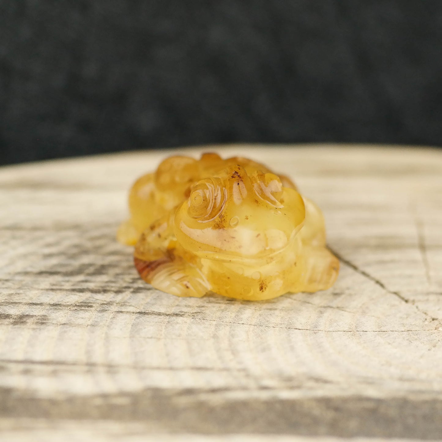 Hand carved frog figurine from natural Baltic amber