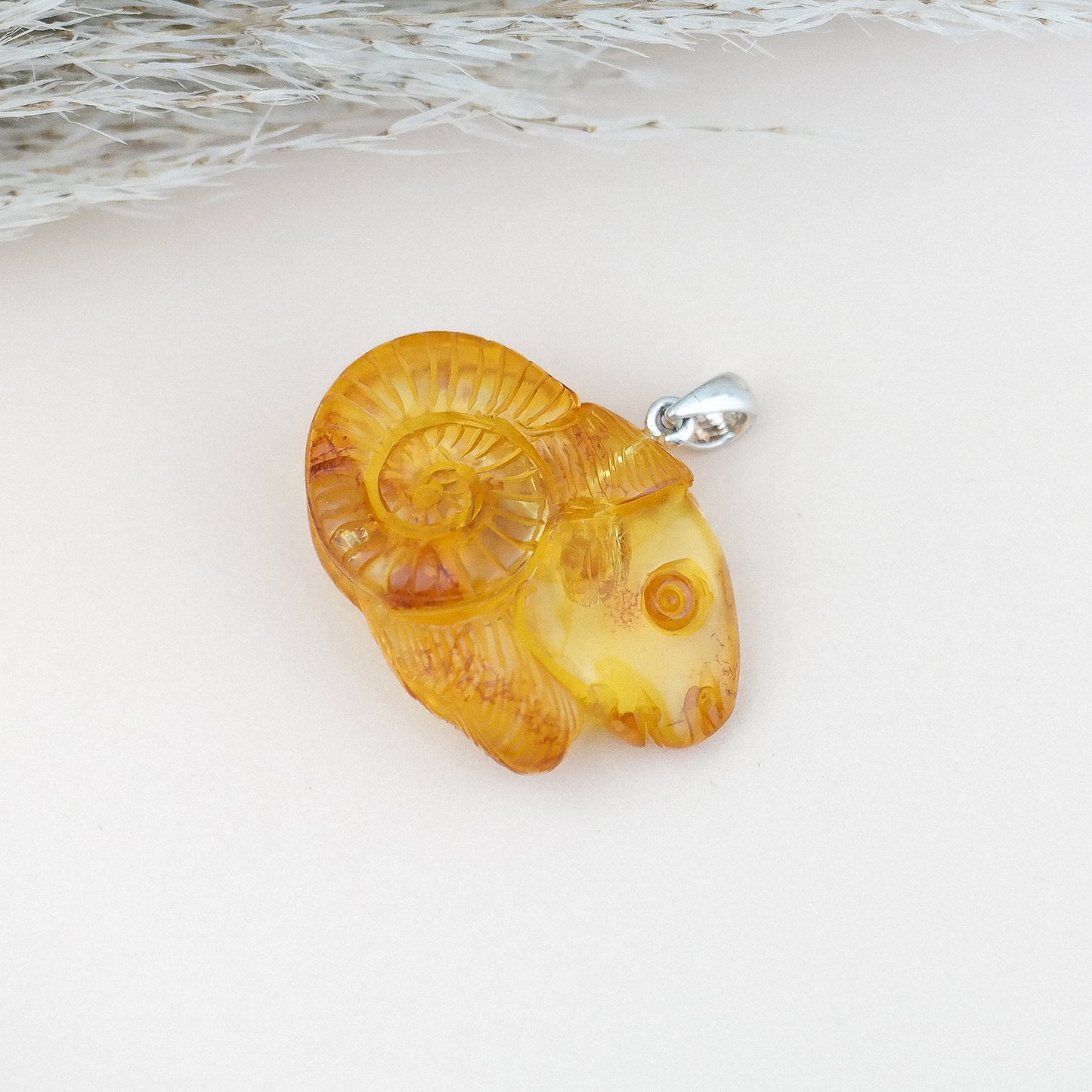 Baltic amber Capricorn zodiac pendant