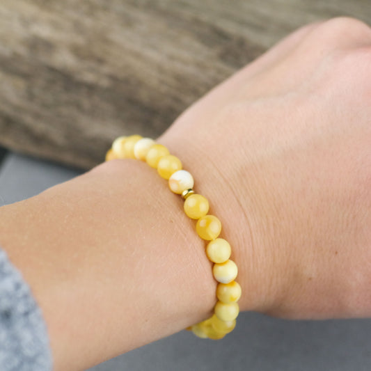 Handmade bracelets from round amber beads