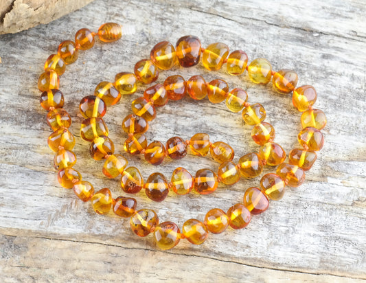 Unisex necklace from cognac amber beads