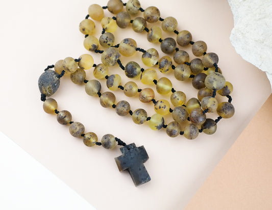 Baltic amber rosary made of green, baroque shaped amber beads