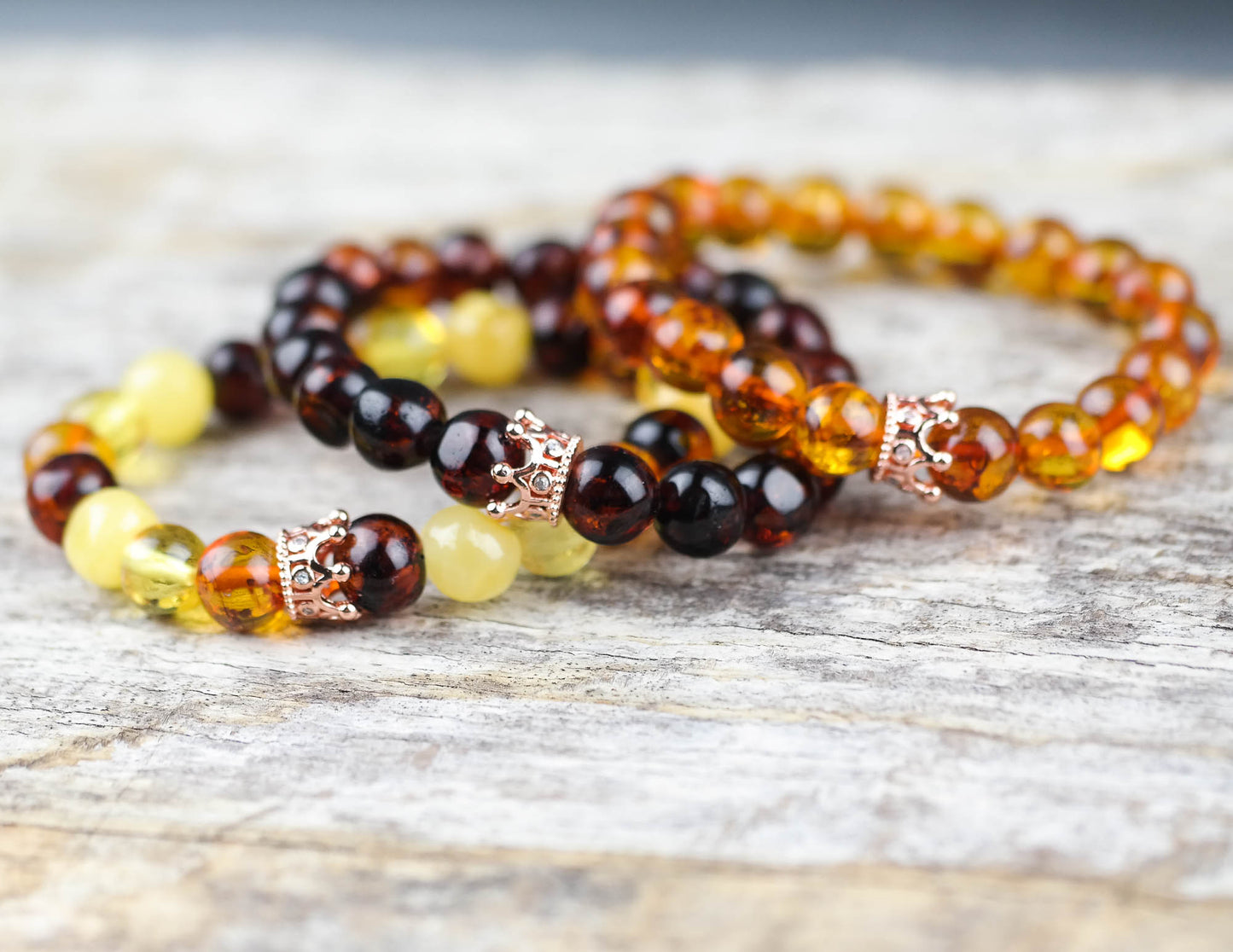 Amber bracelet with rose gold colour crown