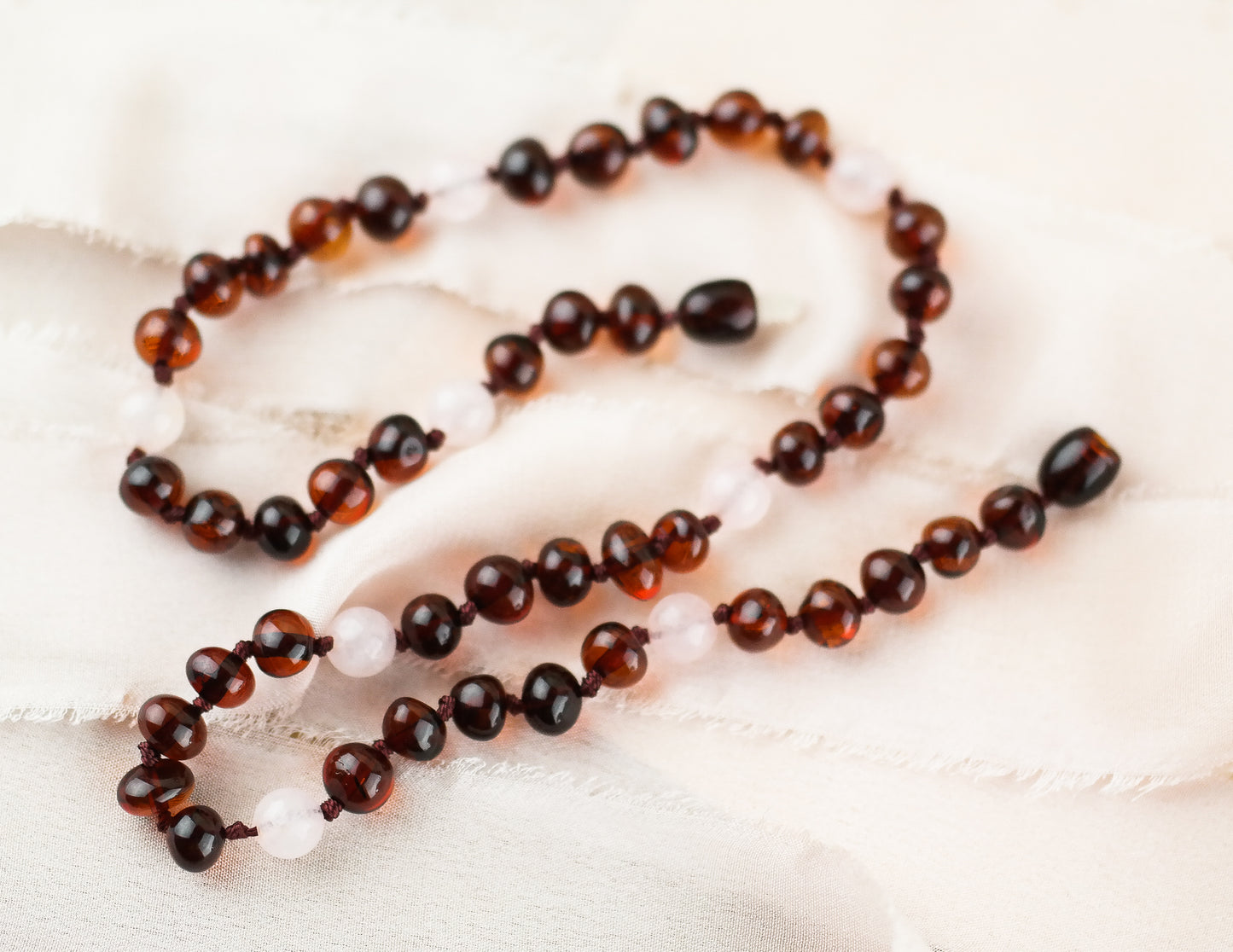 Handmade natural Baltic amber necklaces with rose quartz beads