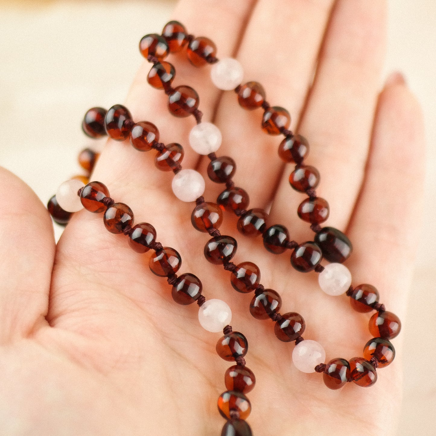 Handmade natural Baltic amber necklaces with rose quartz beads