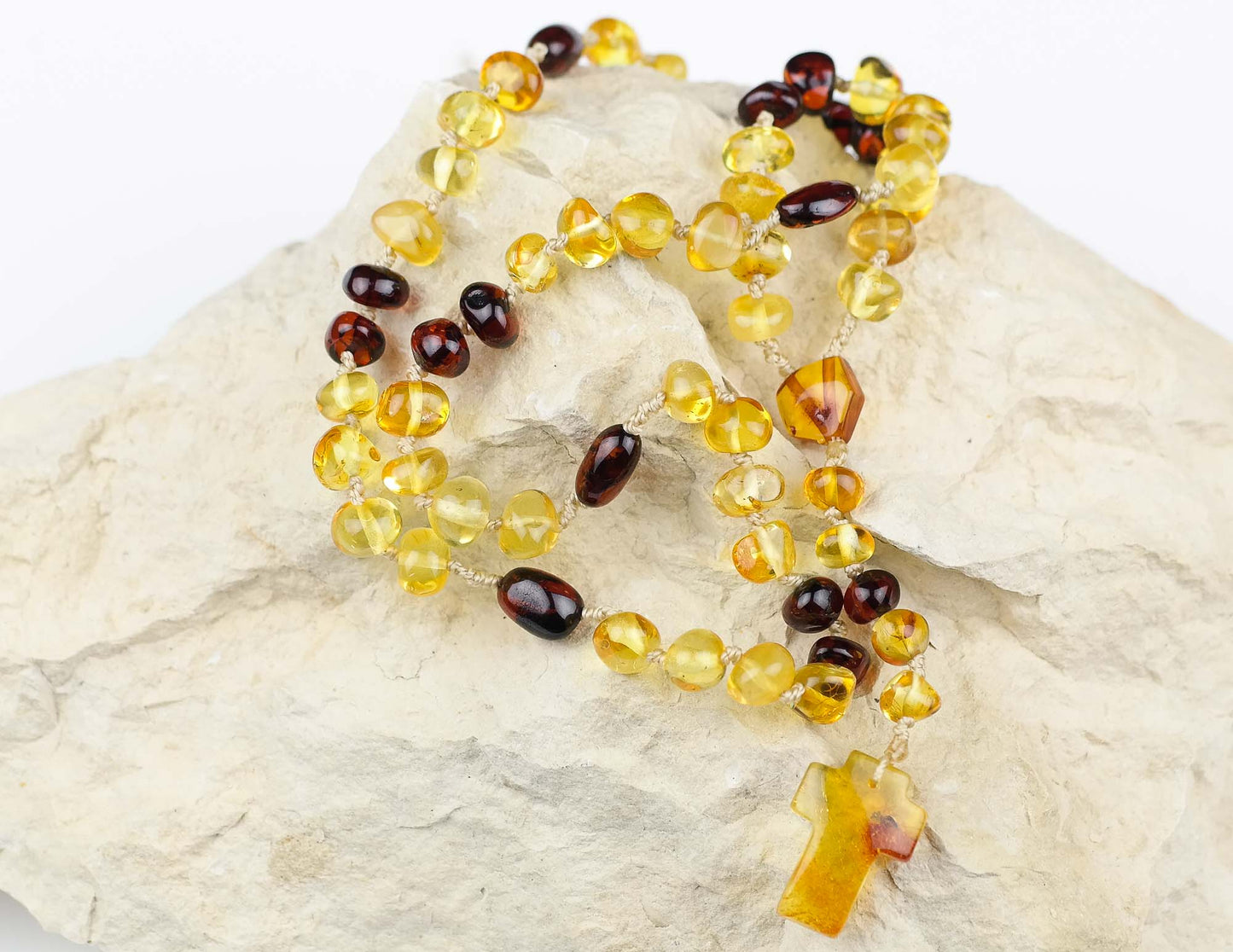 Unique natural Baltic amber rosary with little insect inside the cross