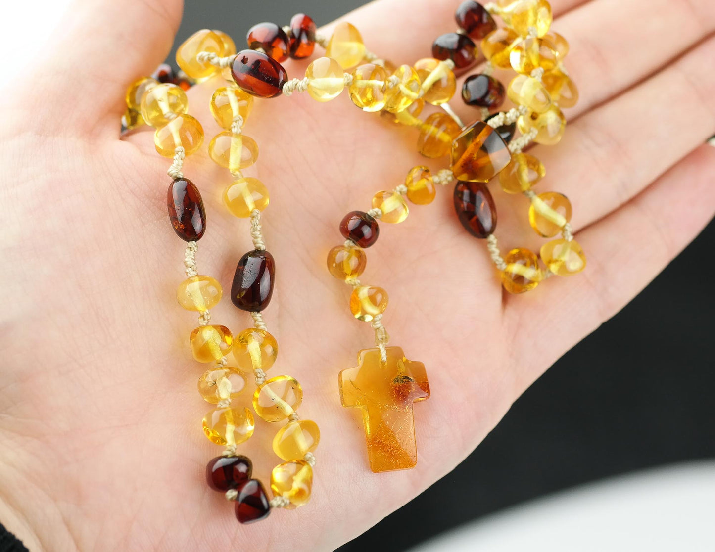 Unique natural Baltic amber rosary with little insect inside the cross