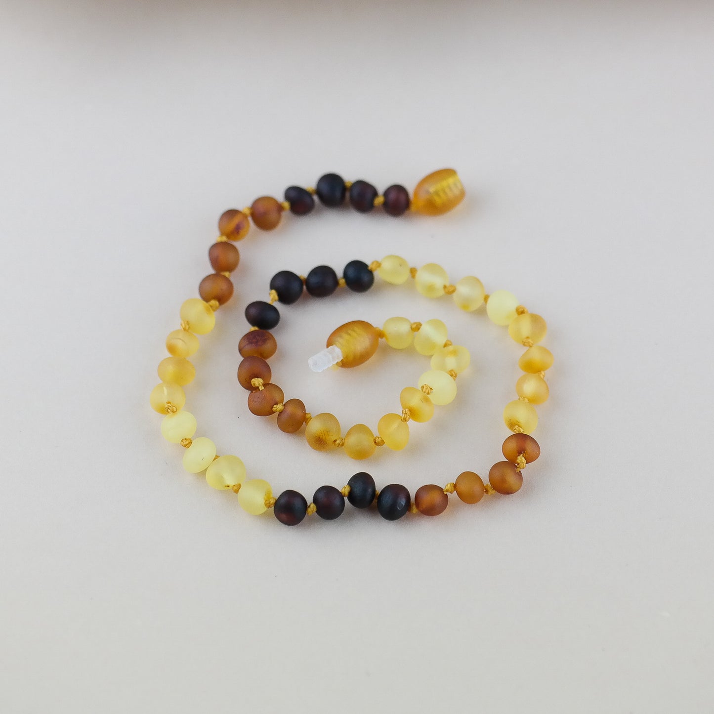 Raw amber rainbow necklaces