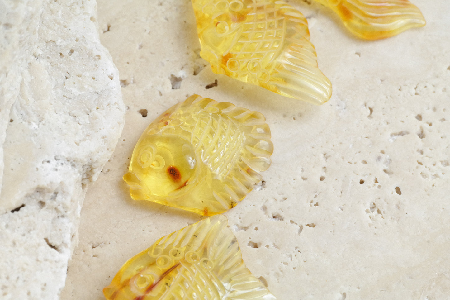 Hand carved fish figurine from natural Baltic amber